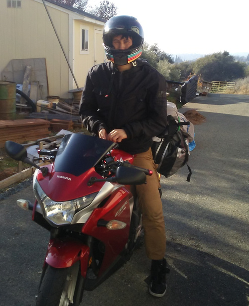 Photo of Ryan on a motorcycle.